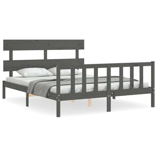 vidaXL Bedframe met hoofdbord massief hout grijs