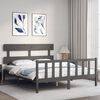 vidaXL Bedframe met hoofdbord massief hout grijs