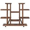 vidaXL Plantenstandaard met wielen 110x25x115 cm massief vurenhout