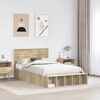 vidaXL Bedframe met plank Sonoma Eiken 135 x 190 cm Bewerkt hout