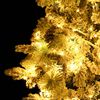 vidaXL Kerstboom met LED en dennenappels en sneeuw 225 cm PVC en PE