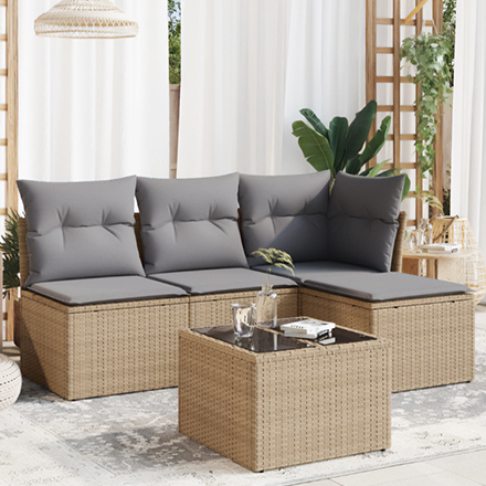 Rotan tuinset met grijze kussens op terras.